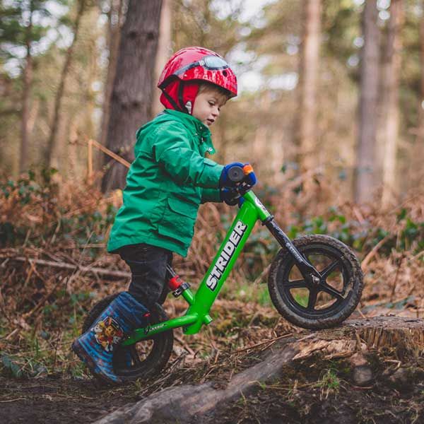 Riding Strider Bike in a forest in the UK