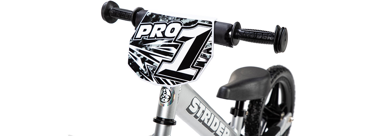 Detail image of silver 12 Pro handlebars with number plate